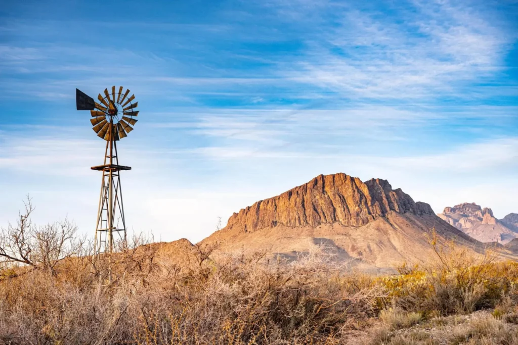 Windmill and Chisos Mountains in Big Bend National Park