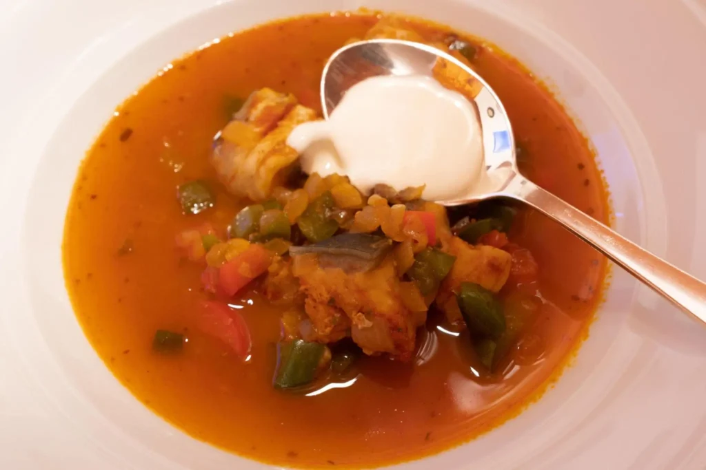 Halaszle, Hungarian Fishermans Soup or Fish Stew with Carp, Bell Peppers, Paprika and Sour Cream