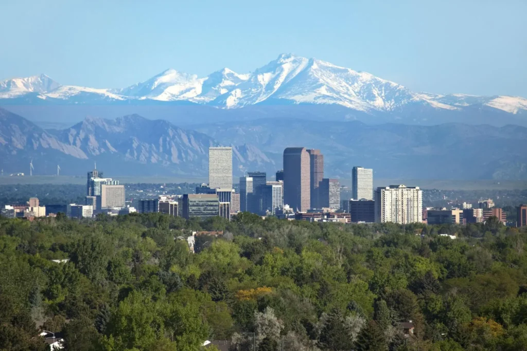Denver Colorado skyscrapers snowy Longs Peak Rocky Mountains