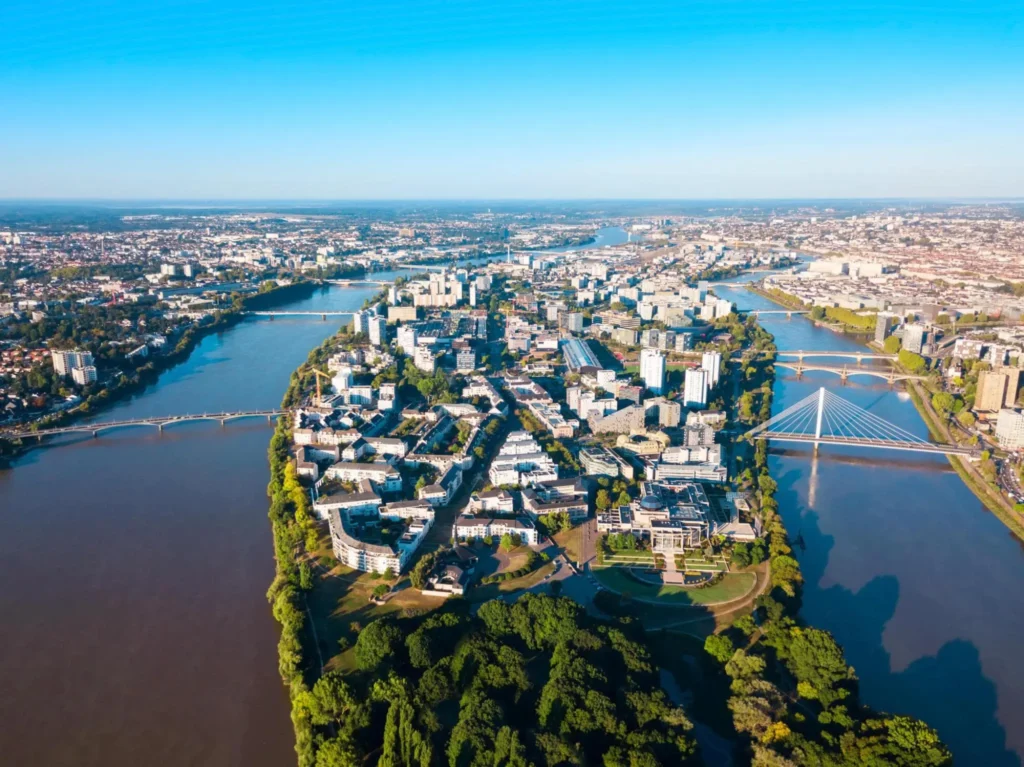 Nantes city between the branches of the Loire river aerial view in Loire-Atlantique region in France