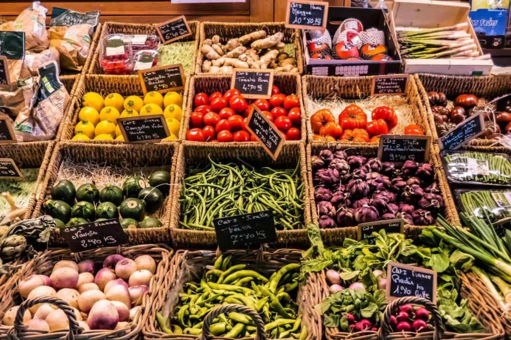 Fruit and vegetables at the counter of a covered market